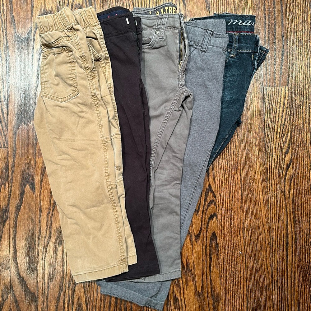 FIVE pairs of boys’ jeans/chinos